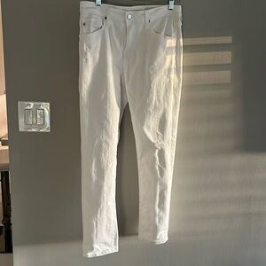 White lightly distressed jeans slouchy slim size 27 by AG. Like new condition